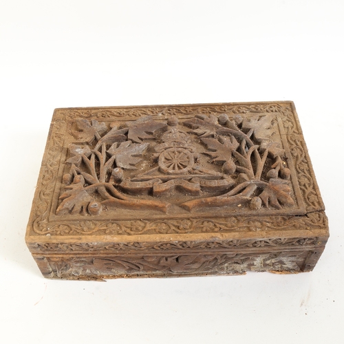 67 - An Eastern carved hardwood Royal Artillery box, with high relief carved insignia lid and original ca... 