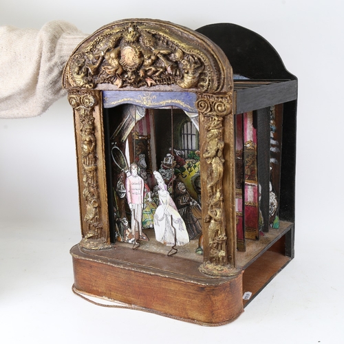 107 - A 19th / early 20th century child's toy puppet theatre, with gilded surround, painted wood sliding c... 