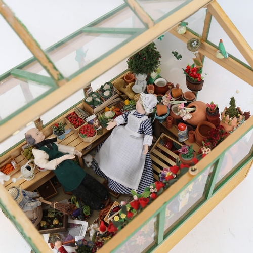 108 - A handmade garden greenhouse diorama, with various fittings, length 32cm, height 28cm