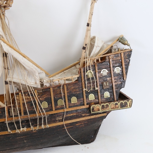 118 - A handmade stained wooden-hulled 3-mast galleon ship, hull length 48cm