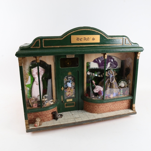 126 - A handmade model shop diorama wall-hanging cabinet, with many fixtures and fittings, W45cm, H36cm, D... 