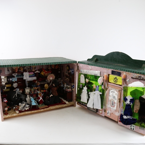 126 - A handmade model shop diorama wall-hanging cabinet, with many fixtures and fittings, W45cm, H36cm, D... 