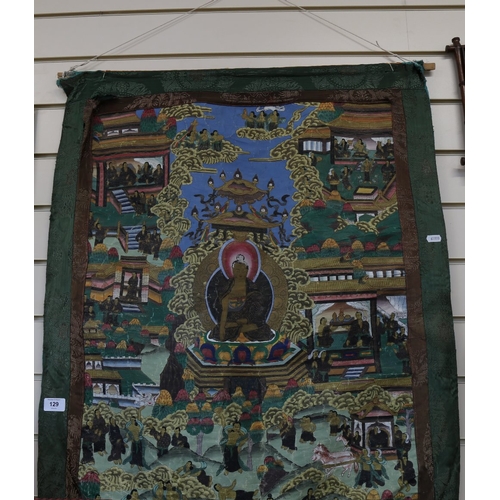 129 - A Thai thangka canvas scroll panel, 80cm x 55cm