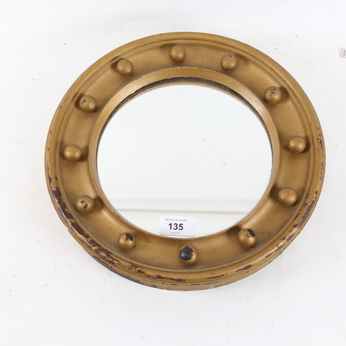 135 - An early 20th century gilt-framed circular wall mirror, overall diameter 30cm