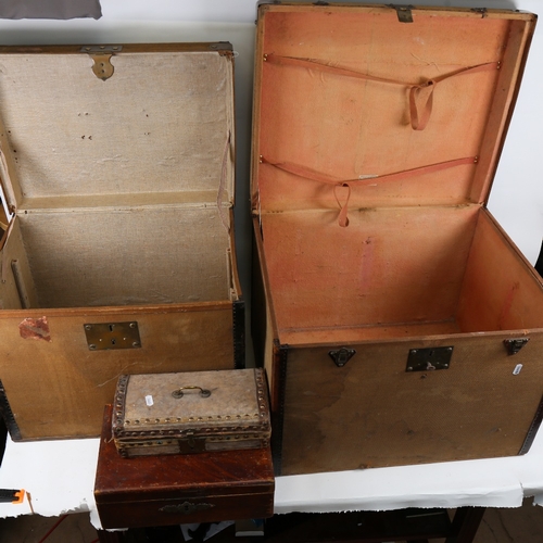 140 - A graduated pair of early 20th century French canvas and metal-bound board travelling trunks, and 2 ... 