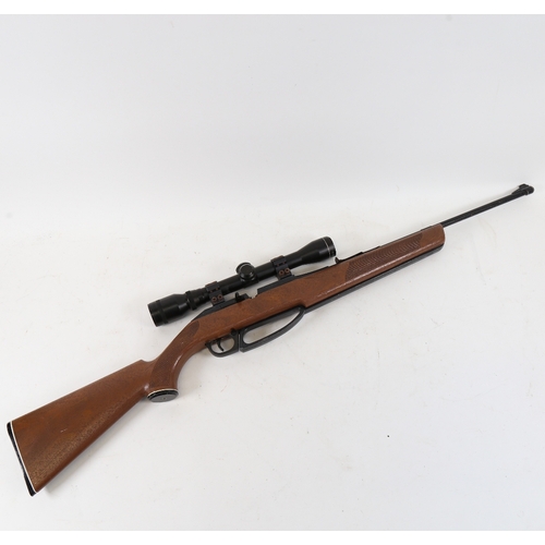 145 - A Daisy Powerline 900 .177 calibre air rifle, with 4x32 telescopic scope and under-lever action, ove... 