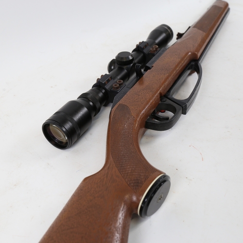 145 - A Daisy Powerline 900 .177 calibre air rifle, with 4x32 telescopic scope and under-lever action, ove... 