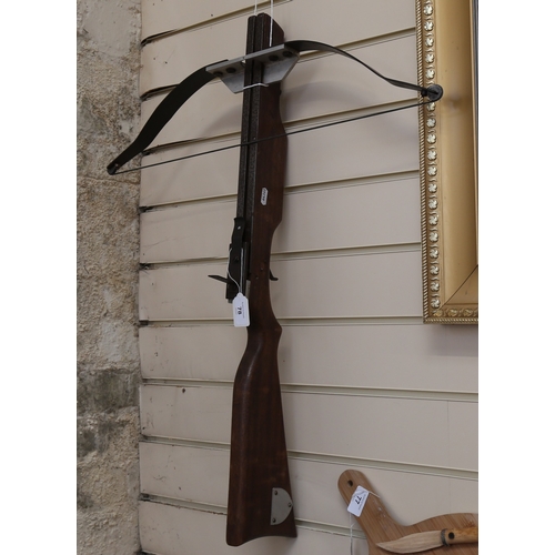 78 - A mahogany steel and aluminium crossbow, overall length 78cm