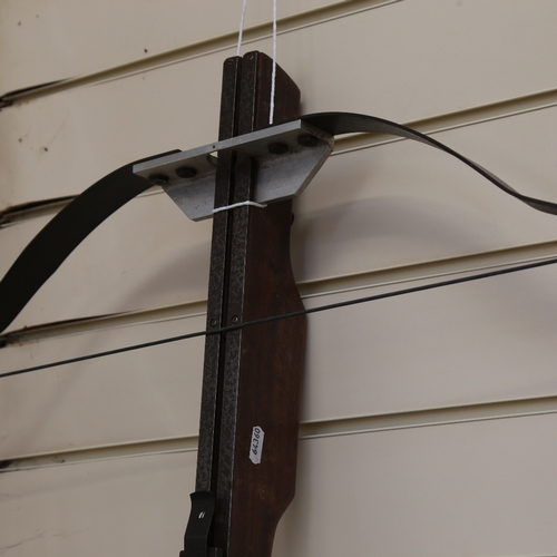 78 - A mahogany steel and aluminium crossbow, overall length 78cm