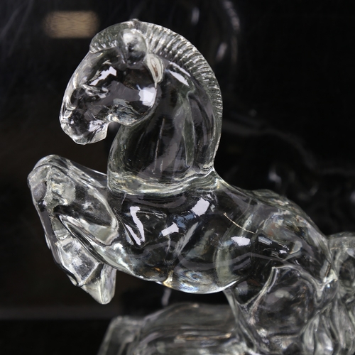 85 - A pair of clear moulded glass rearing horse bookend figures, height 20cm