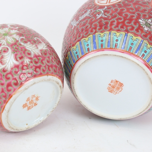 98 - 2 Chinese famille rose ginger jars and covers, pink ground with foliate scrolls and butterflies, wit... 