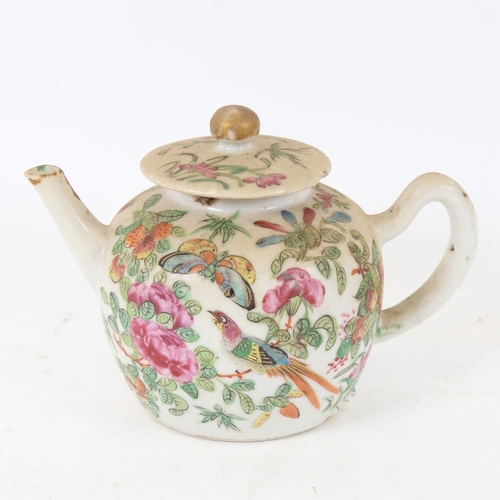 178 - A Chinese famille rose porcelain teapot, hand painted butterfly and floral decoration, height 9cm