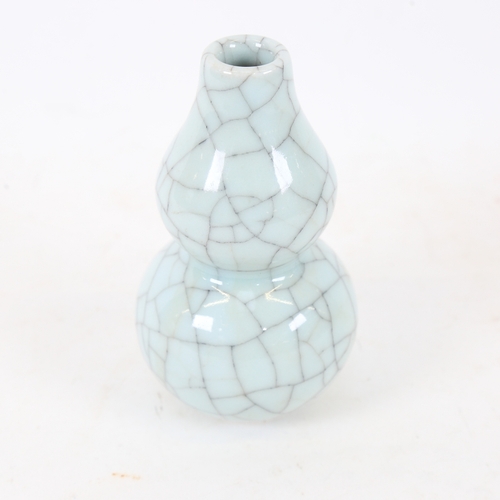 179 - A Chinese blue crackle glaze double-gourd vase, height 12cm