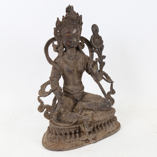 181 - A Chinese patinated bronze seated deity, on double-lotus base, height 22cm