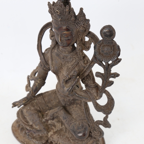 181 - A Chinese patinated bronze seated deity, on double-lotus base, height 22cm