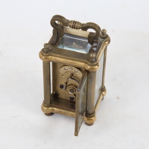 197 - A modern brass-cased miniature carriage clock, bevelled glass exhibition viewing plates, case height... 