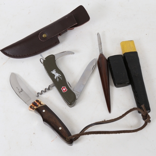 205 - An Elk Ridge steel hunting knife, a Victorinox Swiss Army knife, and a Joseph Rodgers rosewood-handl... 