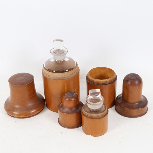 207 - A graduated set of 3 treen boxwood medicine bottle holders, 2 with original fitted glass bottles, ma... 