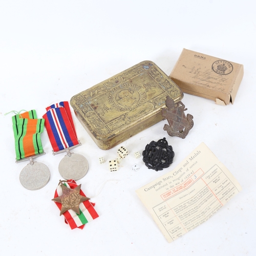 213 - A First World War Princess Mary 1914 Christmas tin, a set of 3 Second World War Service medals, incl... 