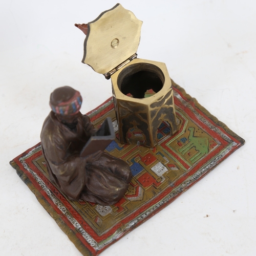 240 - A cold painted metal sculptural desk stand inkwell, in the manner of Bergman, depicting kneeling Ara... 