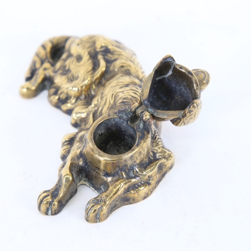 250 - A late 19th/early 20th century brass figural Spaniel dog inkwell, length 13cm, height 5.5cm