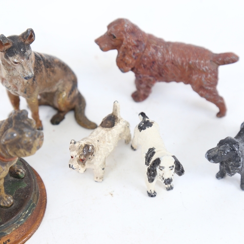 259 - A group of cold painted spelter miniature dog figures, including Alsatian and Spaniel, largest heigh... 