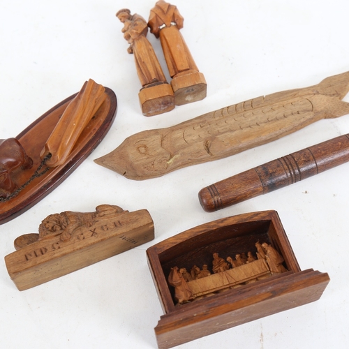 261 - Various carved wood items, including 19th century oak needle case, Lucerne lion, elephant dragging a... 