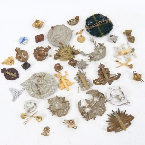 272 - Various military cap badges and brooches, including Bydand, Argyll, and Sutherland Australian Common... 