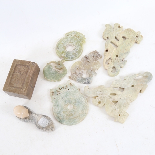 289 - A group of Chinese carved and pierced jade/jadeite Archaic style discs and amulets, and a carved soa... 