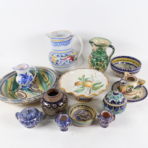 312 - A group of various continental ceramics, including faience Ware jugs and bowls