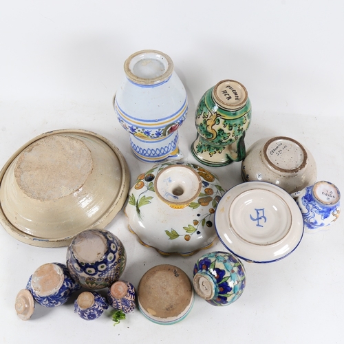 312 - A group of various continental ceramics, including faience Ware jugs and bowls