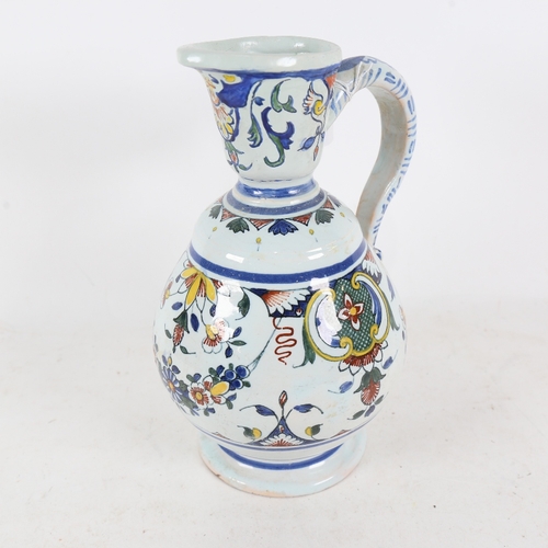 313 - A Dutch Delft tin-glazed pottery ewer, height 26cm