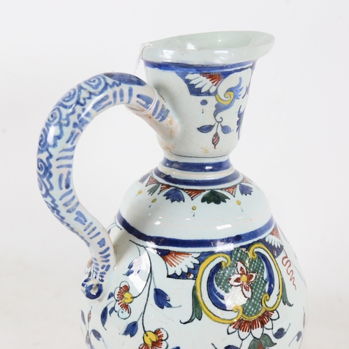 313 - A Dutch Delft tin-glazed pottery ewer, height 26cm