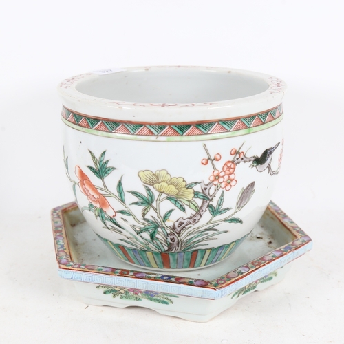 327 - A Chinese jardiniere with floral and bird decoration, height 16cm, and a similar stand with characte... 