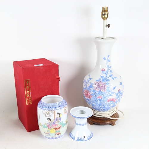 332 - A porcelain table lamp on stand, height 52cm, and a Japanese lamp stand and shade, boxed