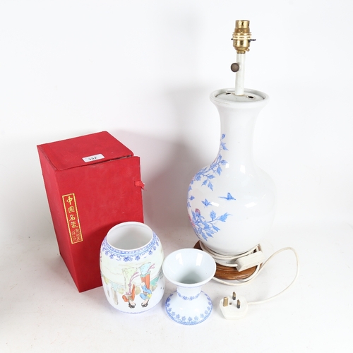 332 - A porcelain table lamp on stand, height 52cm, and a Japanese lamp stand and shade, boxed