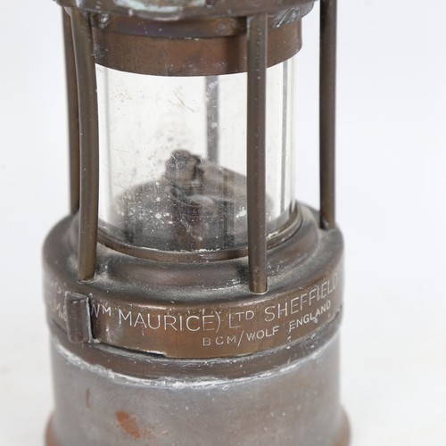 341 - A miner's lamp by The Wolf Safety Lamp Co (WM Maurice) Ltd Sheffield