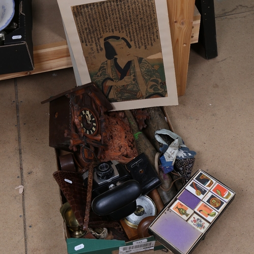 344 - A box of miscellaneous items, including a cuckoo clock, 2 Vintage cameras, 2 skittles etc