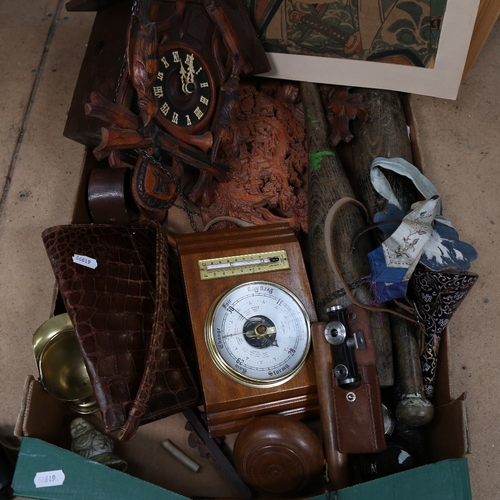 344 - A box of miscellaneous items, including a cuckoo clock, 2 Vintage cameras, 2 skittles etc