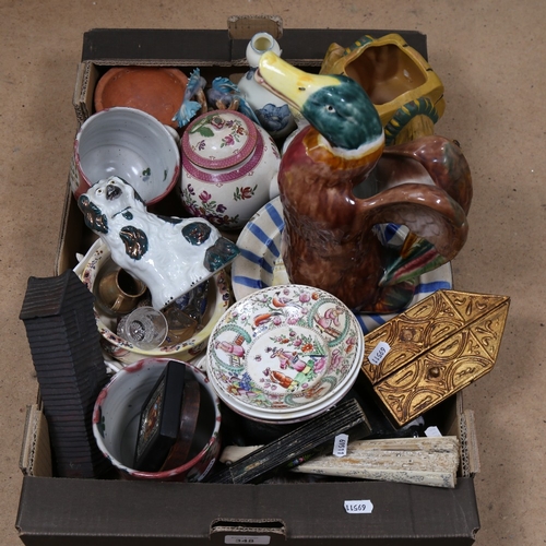 348 - A quantity of ceramic items, including a Staffordshire dog, a teapot, religious icons, fan etc