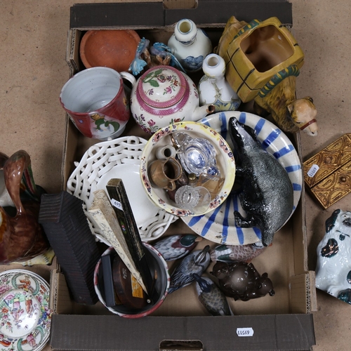 348 - A quantity of ceramic items, including a Staffordshire dog, a teapot, religious icons, fan etc