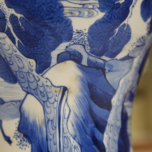 179 - A Chinese 18th century blue and white porcelain vase, hand painted mountain landscapes, height 47cm,... 