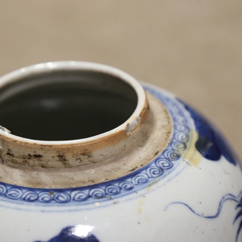 91 - A 19th century Chinese blue and white porcelain jar with hand painted dragon decoration, height 20cm