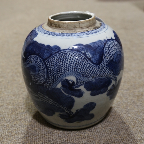 91 - A 19th century Chinese blue and white porcelain jar with hand painted dragon decoration, height 20cm