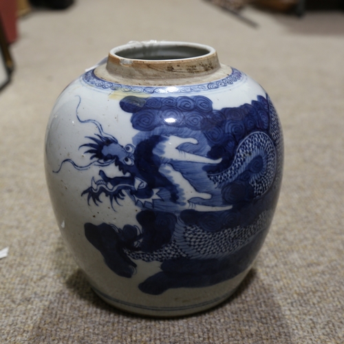 91 - A 19th century Chinese blue and white porcelain jar with hand painted dragon decoration, height 20cm