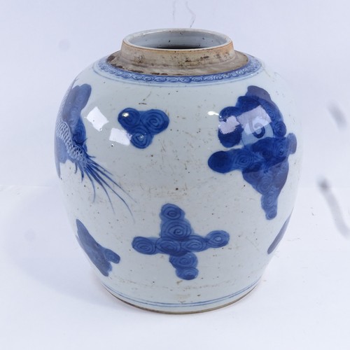 91 - A 19th century Chinese blue and white porcelain jar with hand painted dragon decoration, height 20cm