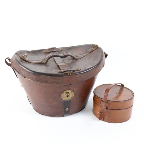 277 - A Victorian studded leather travelling top hat box, and a leather travelling collar box, largest hei... 