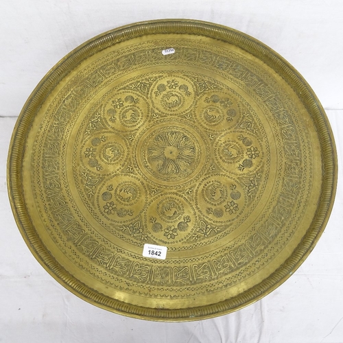 1842 - An Indian engraved brass-top table, on carved and pierced folding base, W58cm, H58cm