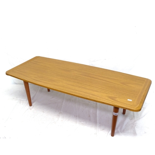 1854 - A mid-century rectangular coffee table, on tapered legs, W109cm, H33cm, D44cm