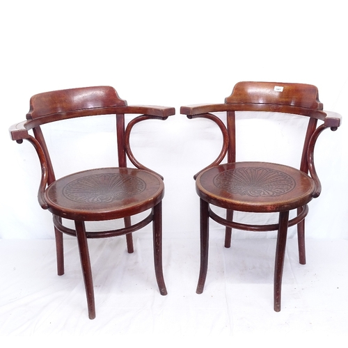 1861 - A pair of early 20th century Thonet bentwood elbow chairs, with maker's paper label and stamp